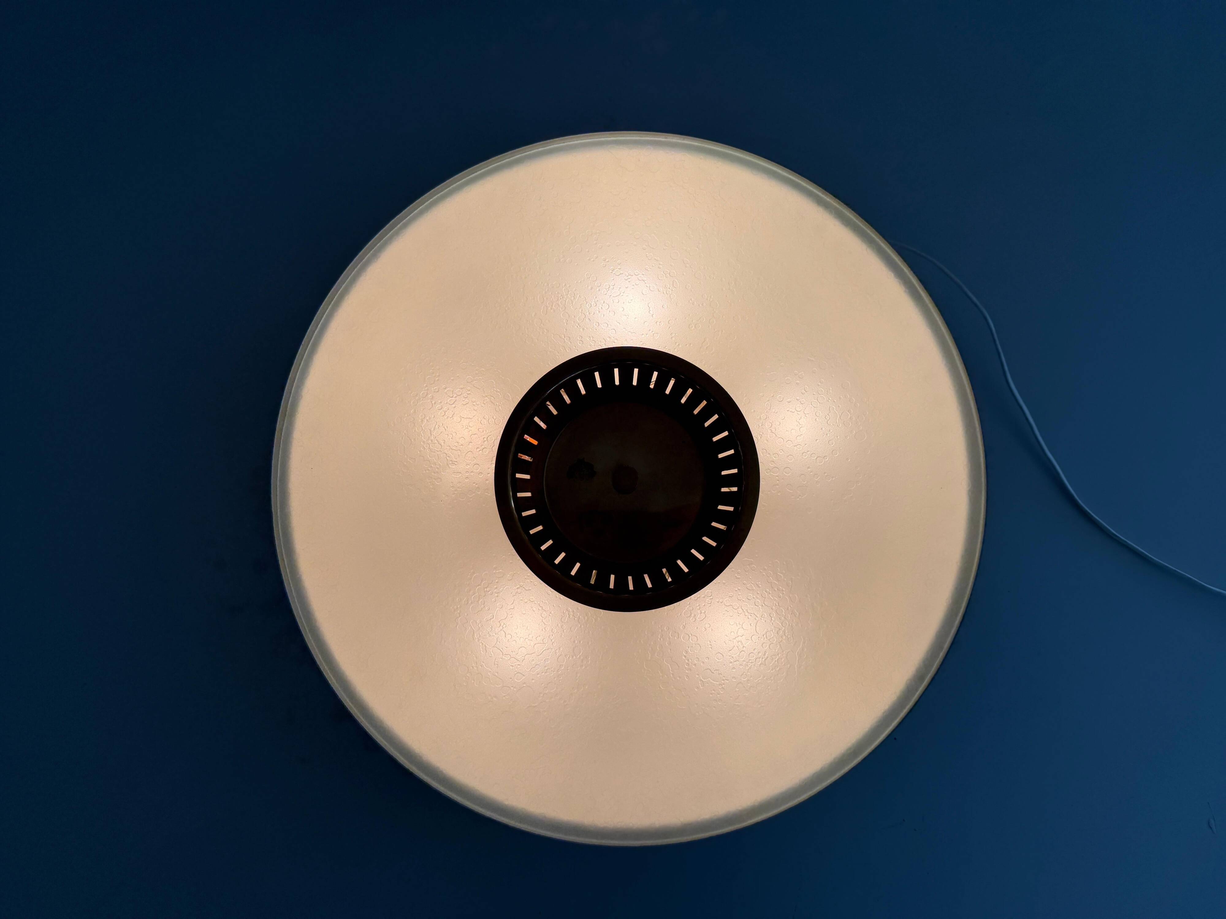 Flush-mounted metal frame with dark blue glass, Attributed to Stilnovo, 1950s, Italy.