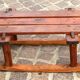 Rustic bench, old folk art, snow sled, Alps.