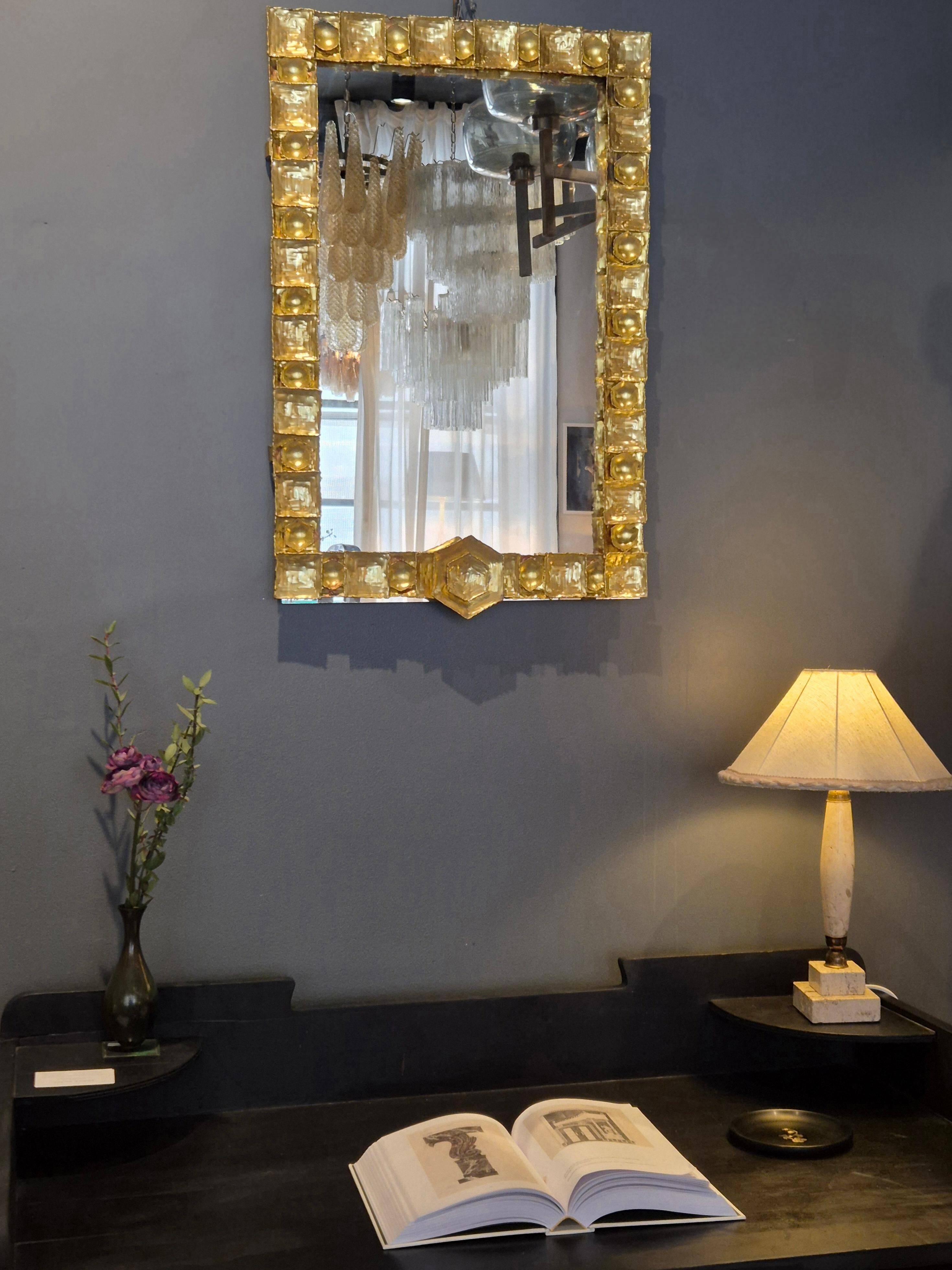 Brutalist brass mirrors by Claës E. Giertta
