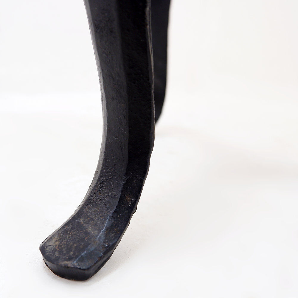 Tripod floor lamp in wrought iron and brass with bamboo-style base.