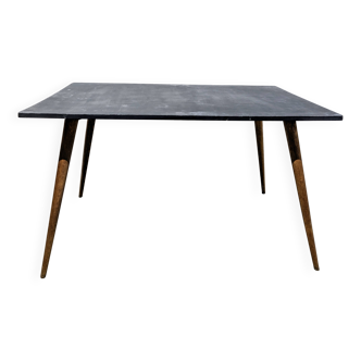 Table vintage aux pieds compas