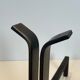 Pair of modernist and wrought iron fire dogs