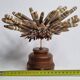 Antique sea urchin pencil on turned wooden base, 22 cm