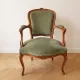 Pair of cabriolet armchairs in Louis XV style in green velvet.