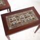 Set of coffee tables in rosewood and ceramic.