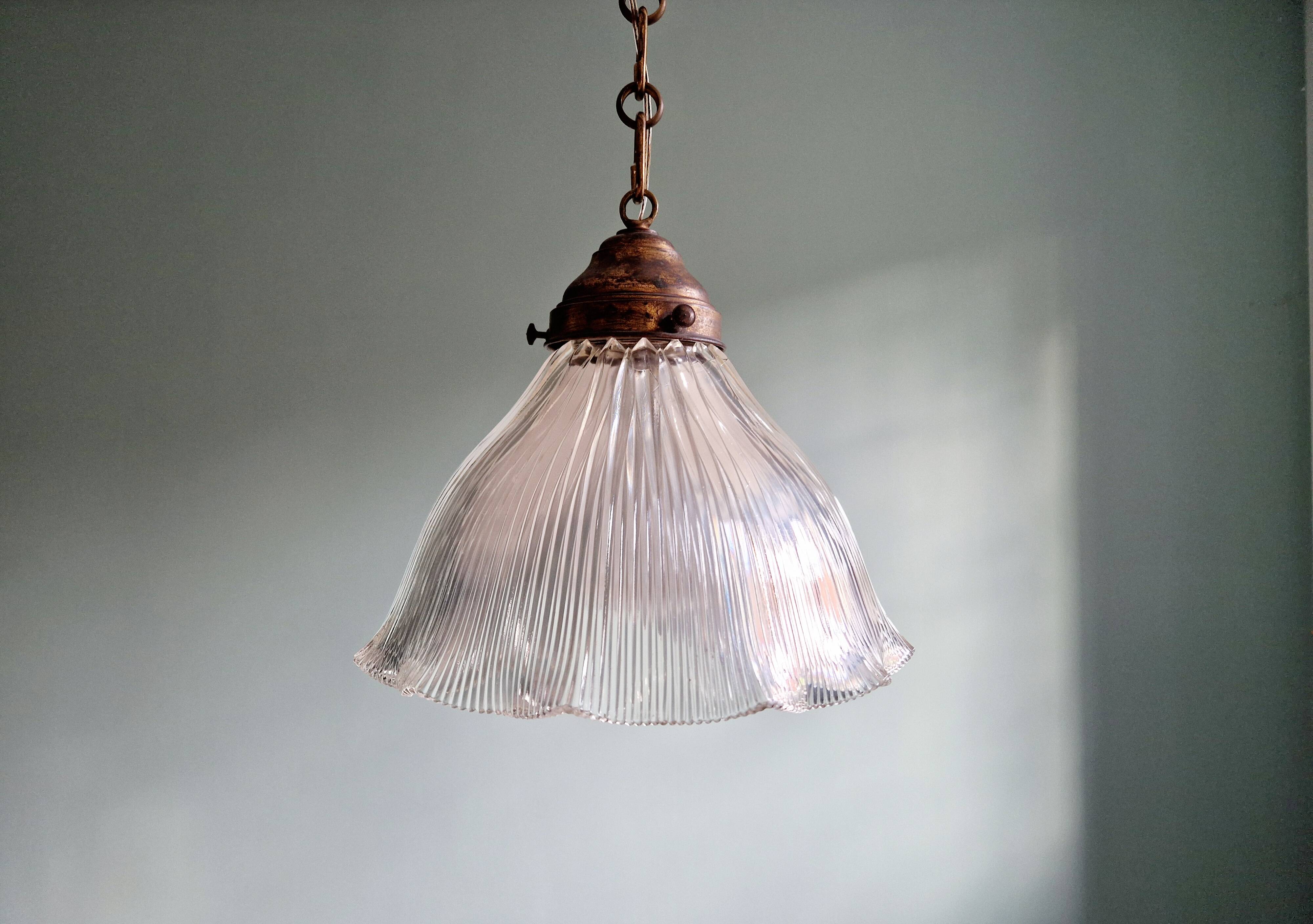 Large Holophane pendant light in transparent grooved glass