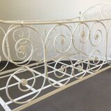 White wrought iron folding bed