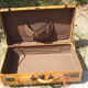 Old quality brown leather suitcase from the 60s