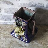 Slip vase decorated with flowers