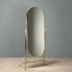 Brass vanity mirror with adjustable tilt