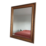 Miroir bois sculpté patine doré