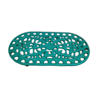 Dessous de la plat en fonte peint bleu