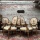 Suite de cinq fauteuils à dossier médaillon de style Louis XVI