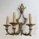Pair of Louis XV style bronze wall sconces with 3 lights