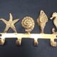 Coat rack or towel rack vintage bronze shells