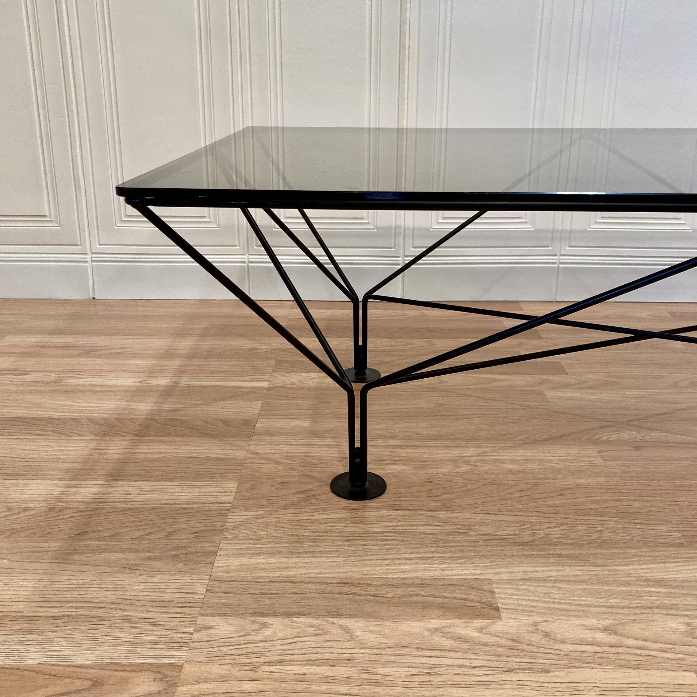Designer glass and metal coffee table.