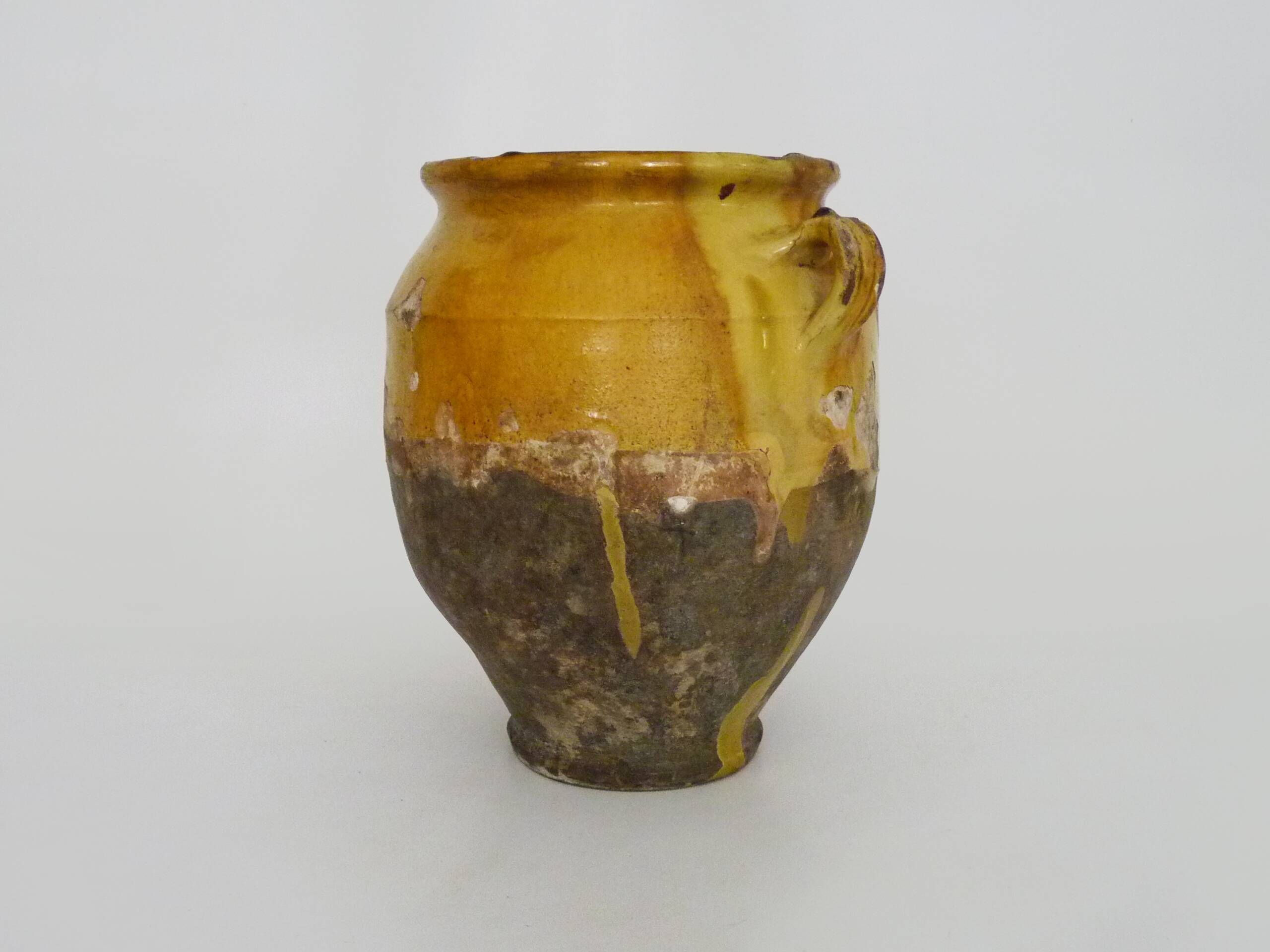 Magnificent glazed yellow confit pot, south-west of France. 19th century.