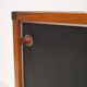 Enfilade en bois avec portes noires par George Coslin