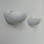 Pair of vintage wall lights in matte white lacquered metal, Italy, 1980.