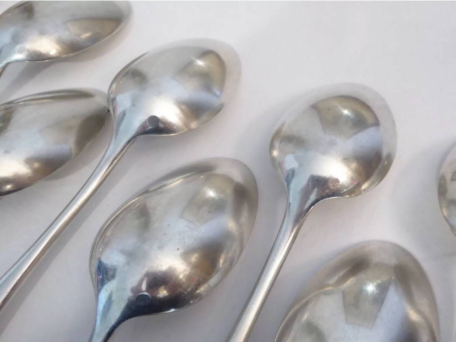 10 silver plated metal table spoons