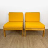 Pair of vintage Scandinavian armchairs in pine and fabric.