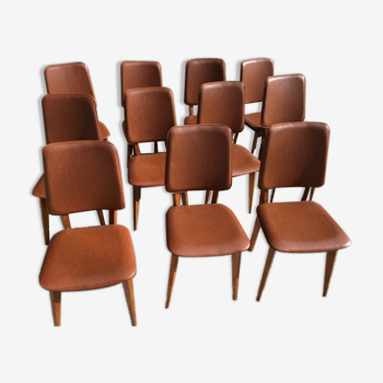 Lot de 10 chaises vintage skaï marron et structure bois années 60/70
