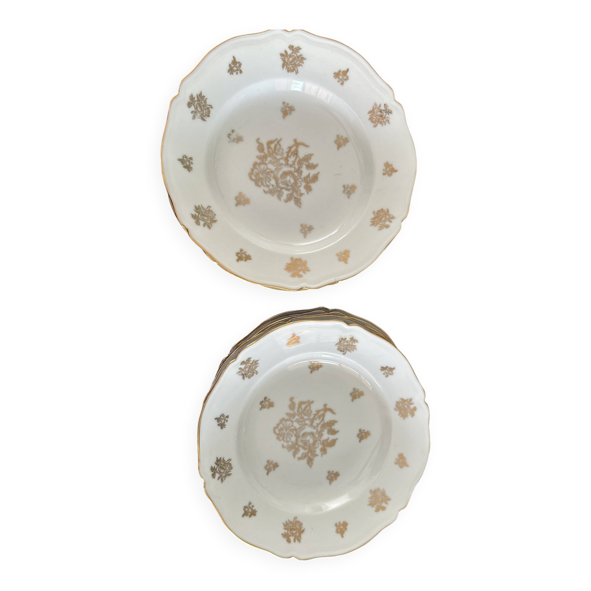 This white porcelain plate features a scalloped edge and elegance.