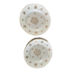 This white porcelain plate features a scalloped edge and elegance.