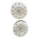 This white porcelain plate features a scalloped edge and elegance.
