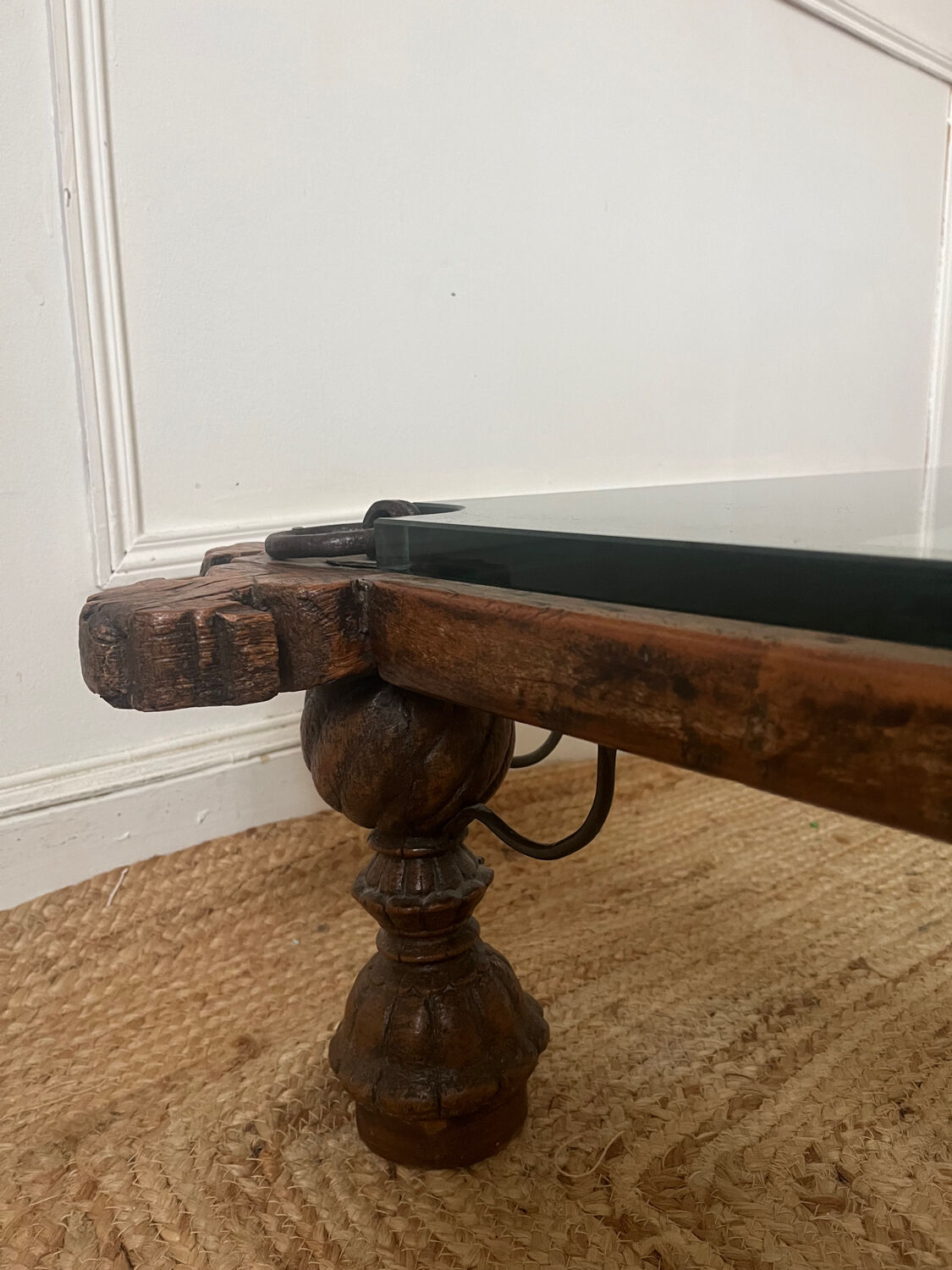 Indian coffee table made of wood and wrought iron.