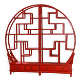 Red shelf with sculpted base