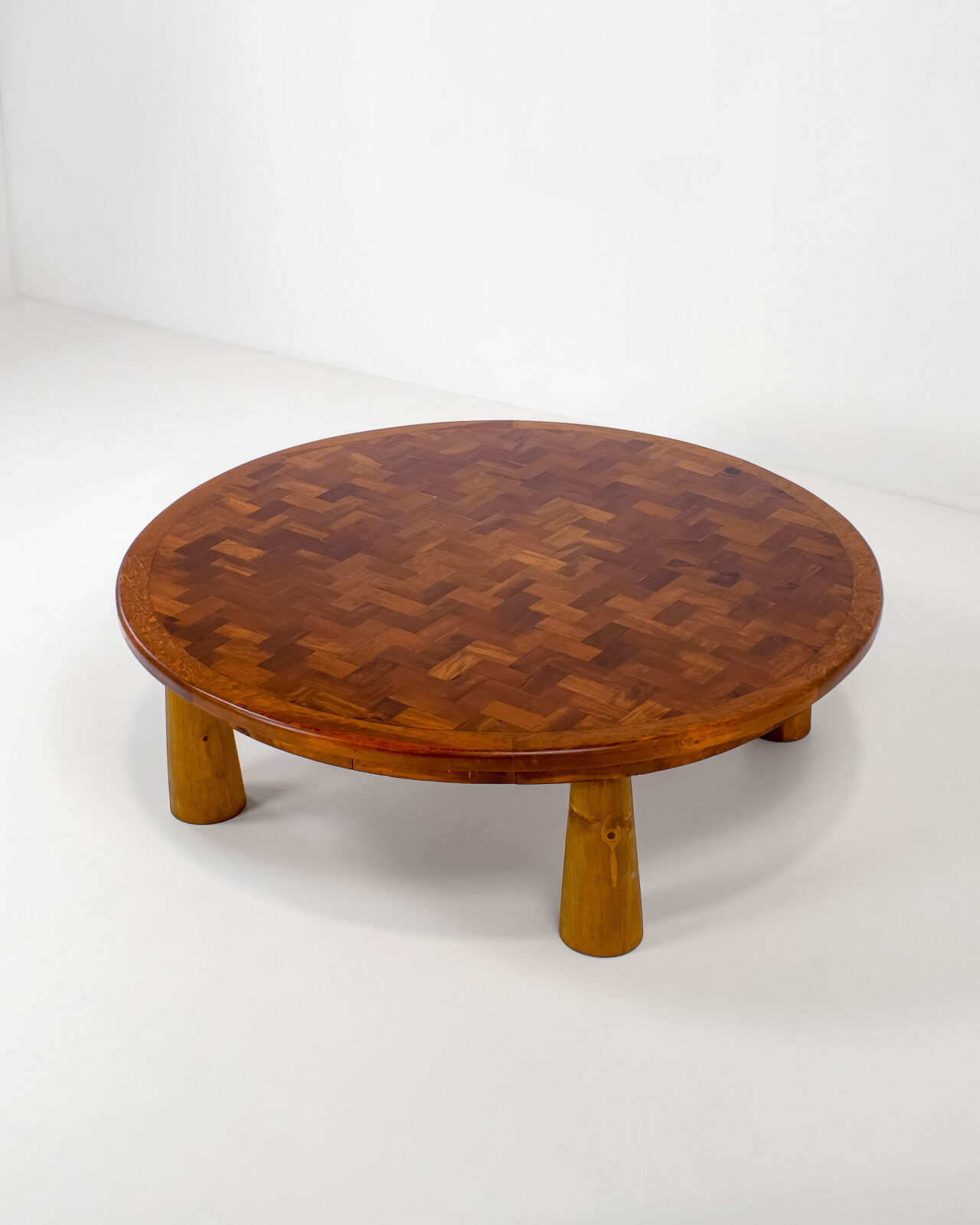 Round parquet coffee table with conical legs, spain