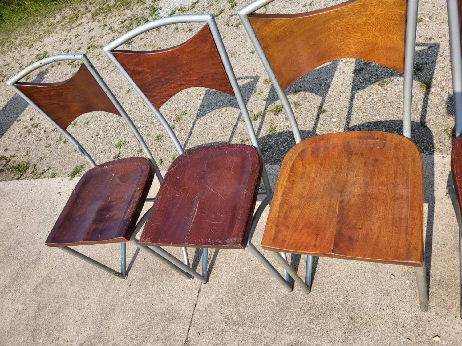 Set of 10 tubular oak bistro dining chairs in vintage industrial style.