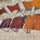 Set of 10 tubular oak bistro dining chairs in vintage industrial style.