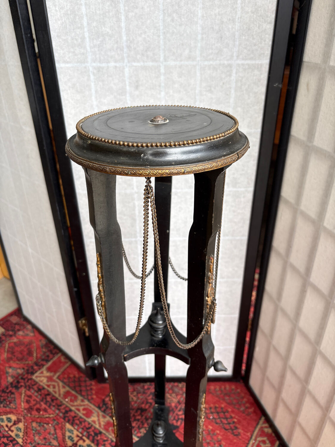 Napoleon III side table in blackened wood and bronze, decorated with chains, 19th century.