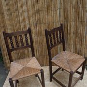 Pair of antique straw-seated farm chairs