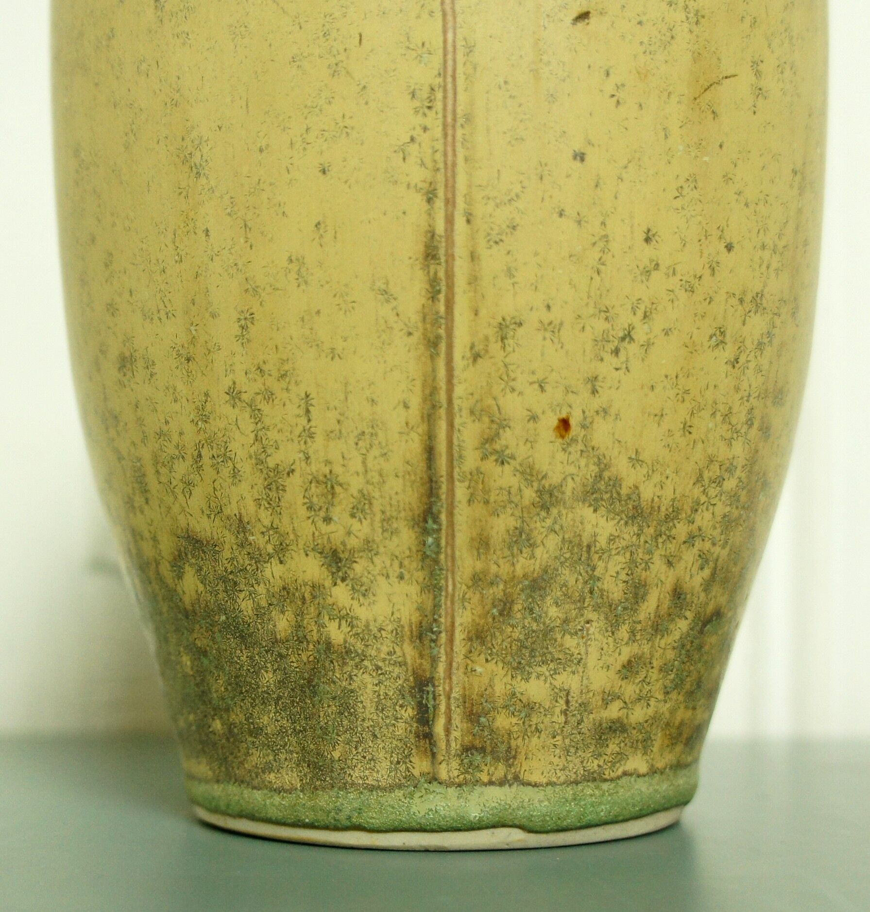 Glazed porcelain pitcher