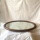 Large Art Deco oval mirror in carved wood - 87 x 53 cm