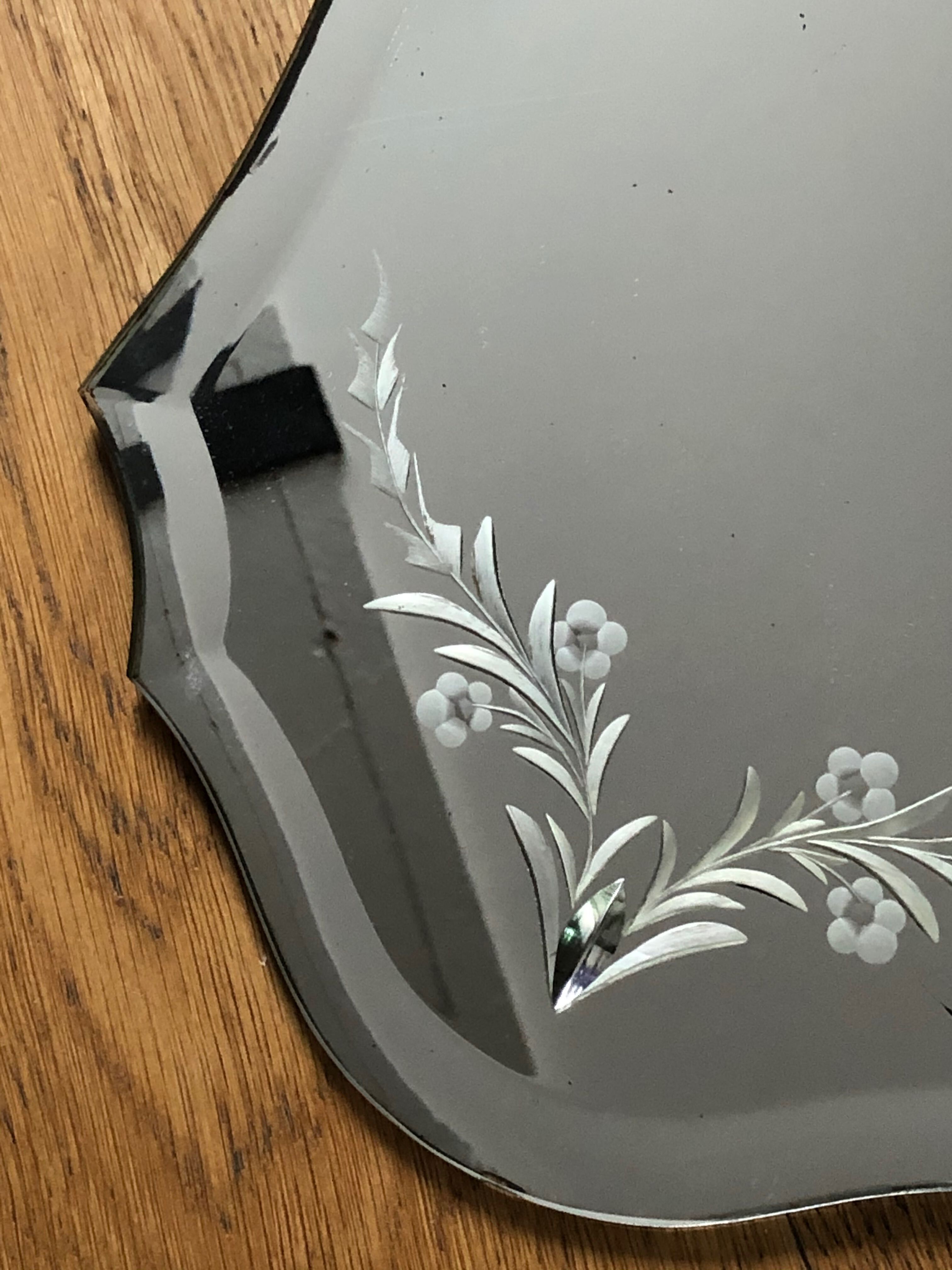 Old bevelled and engraved mirror   43x63cm