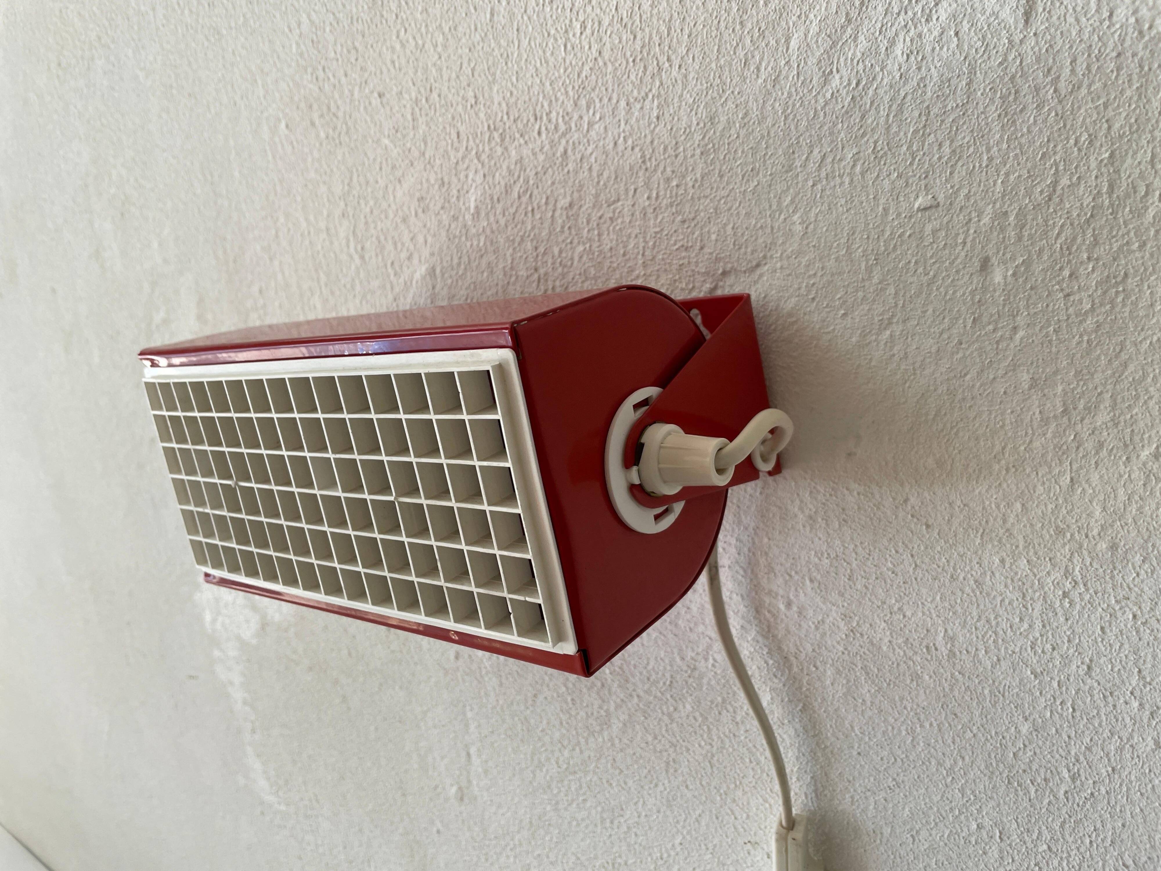 Simple red metal wall light from the AGE, 1970s, Germany.