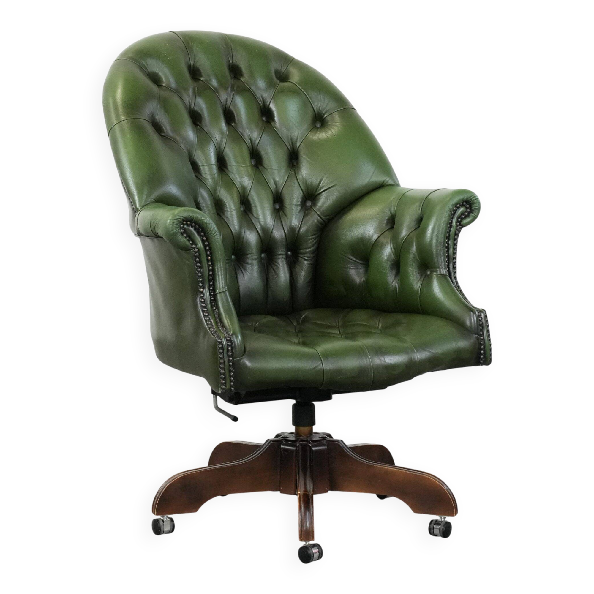 Large green cowhide Chesterfield office chair in English style on wheels