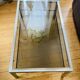 1970s coffee table in brushed metal, brass and smoked glass by Willy R