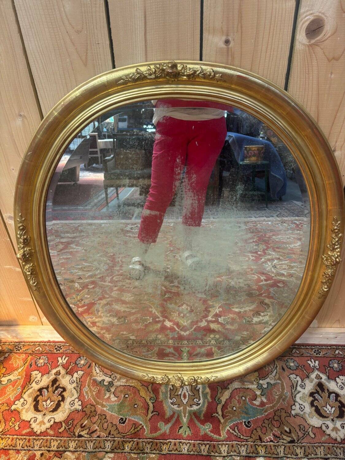 Miroir ovale biseauté bois doré style Louis XVI XIXe siècle