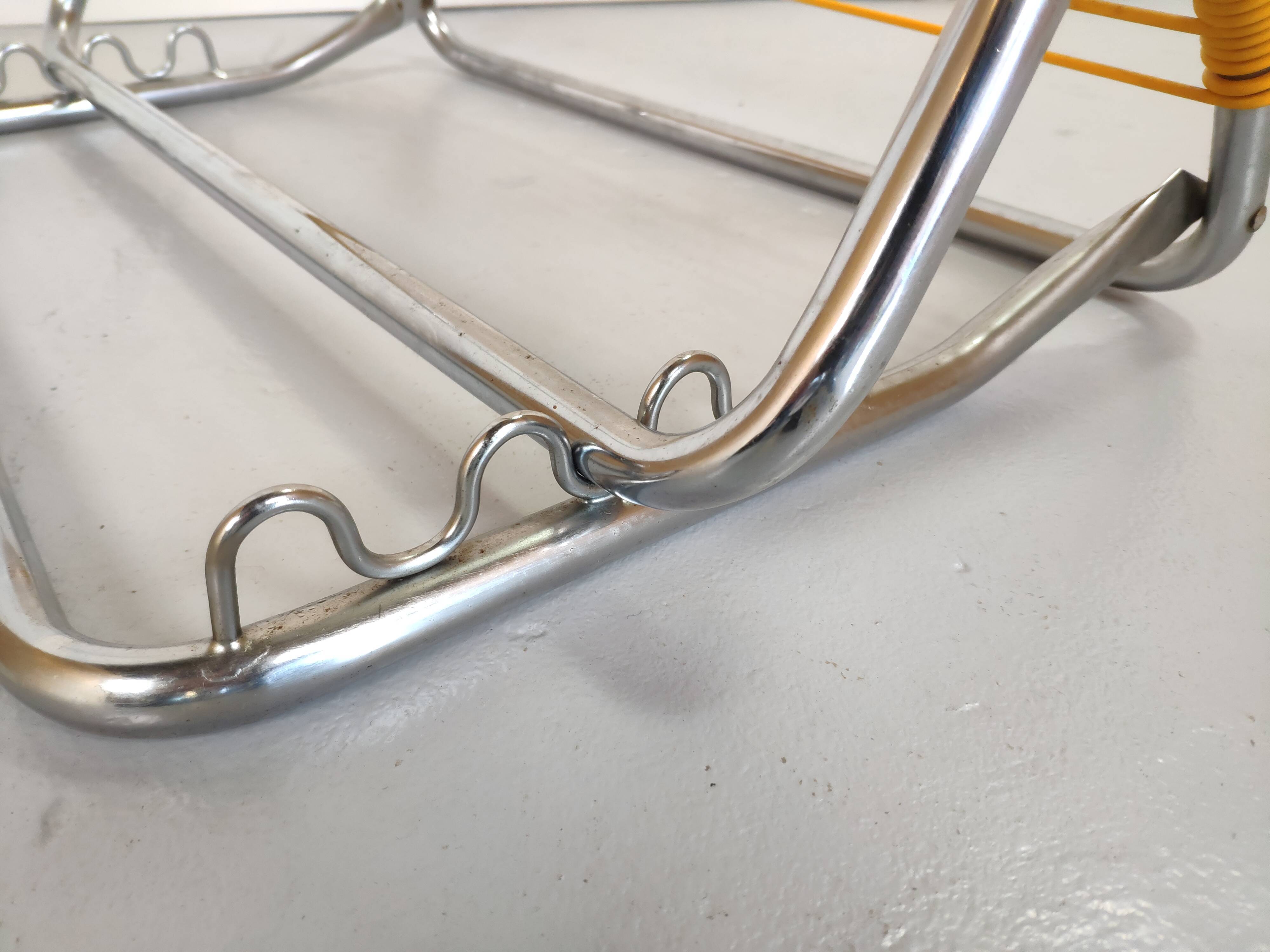 Yellow scoubidou head rest and vintage chrome metal