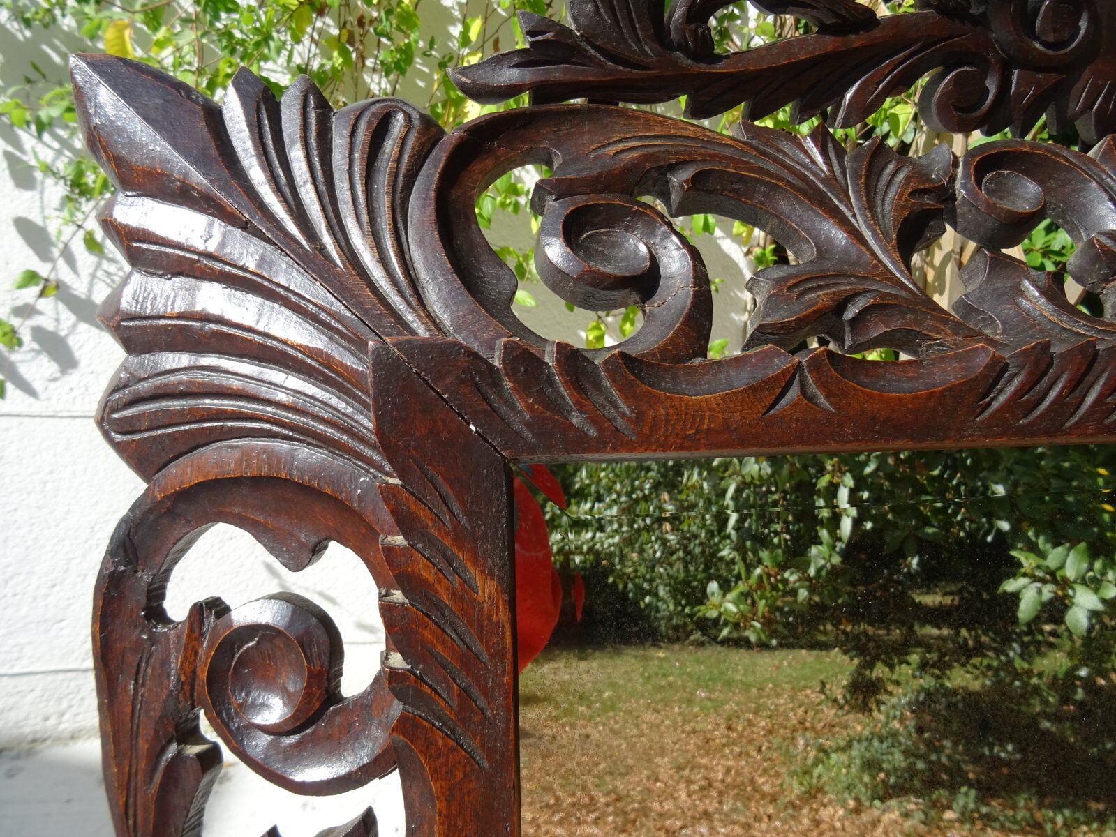 Miroir sculpté fronton lions