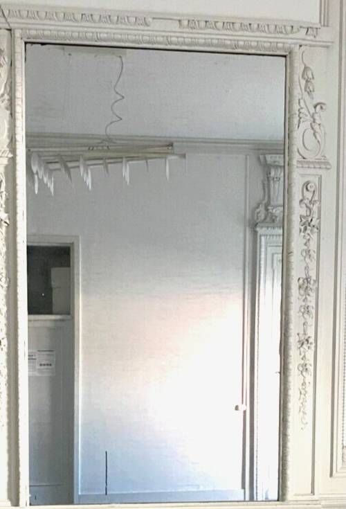 Louis XVI style mirror in wood and carved stucco 20th century