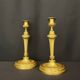 Pair of gilded bronze candlesticks in the Louis XVI style