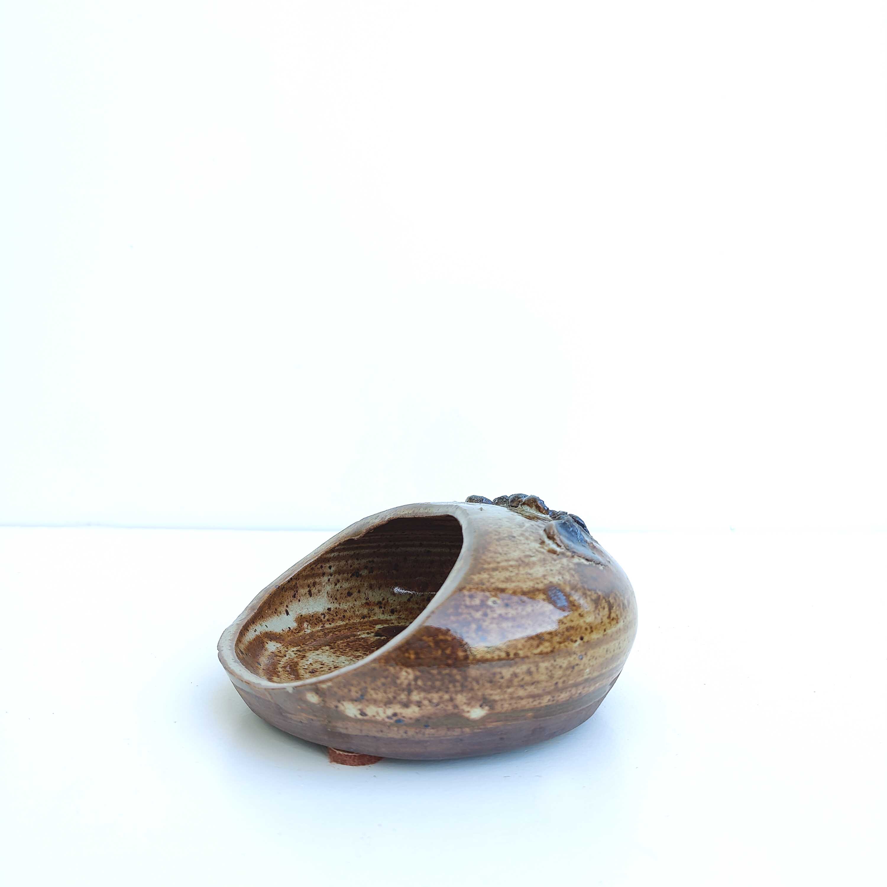 Empty vintage stoneware pocket