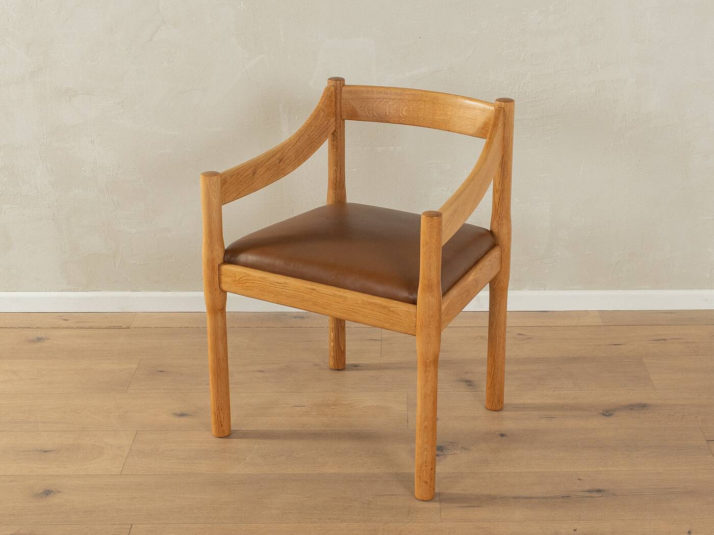 Carimate armchair by Vico Magistretti for Cassina