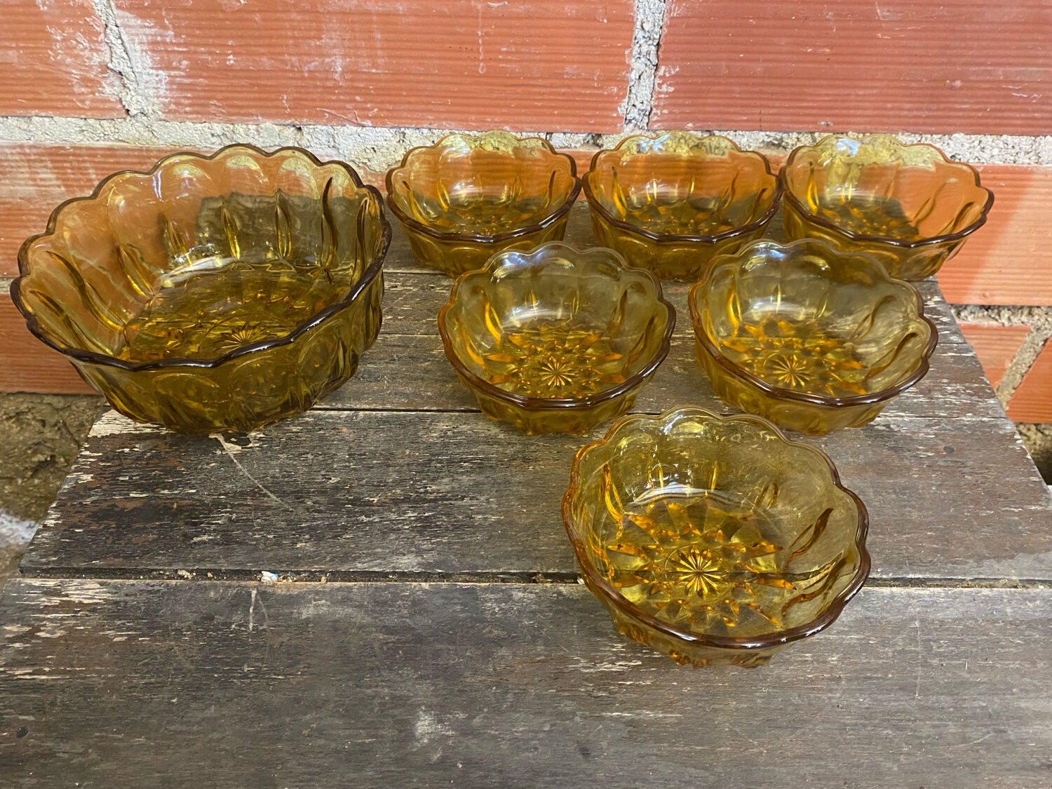 Salad bowl + 6 vintage amber orange moulded glass bowls from the 1970s.